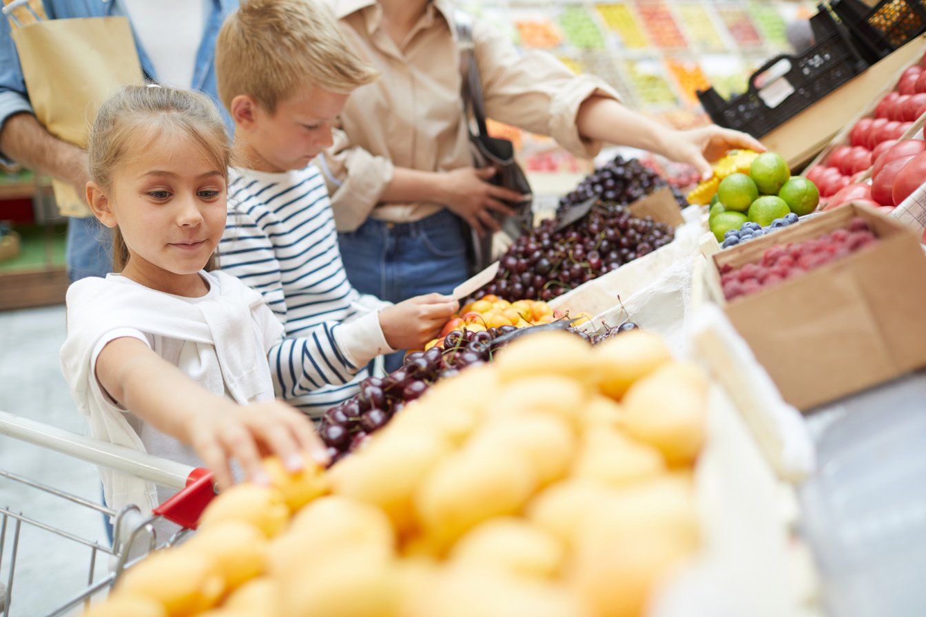 Kids Choosing Fresh Fruits at Farmers Market